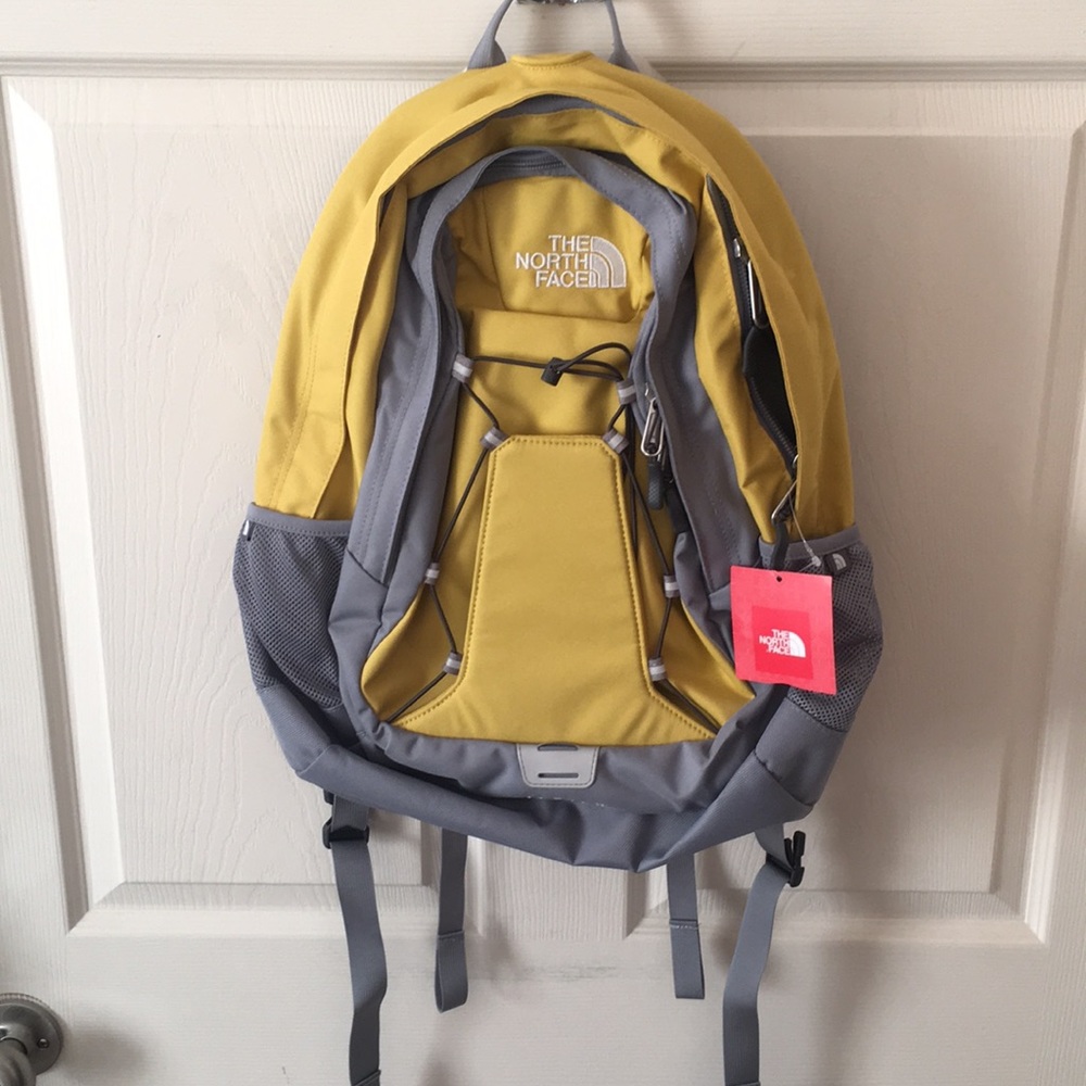 Yellow north face back pack